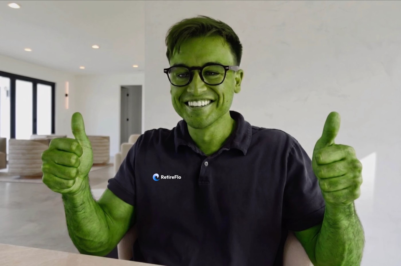 A very enthusiastic RetireFlo team member painted AgencyBloc green, giving two thumbs up